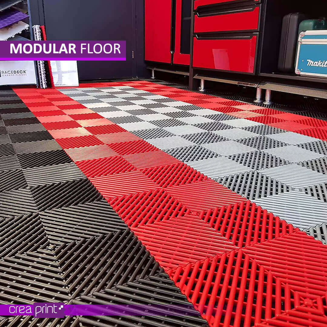 Modular floor mats made of polypropylene, featuring anti-slip, drainage, and heavy-duty load-bearing capabilities for garages, pools, and industrial spaces.