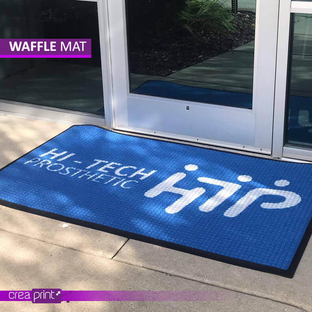 Custom waffle texture logo door mat for high-traffic areas, featuring dirt-trapping design, non-slip backing, and personalized branding.