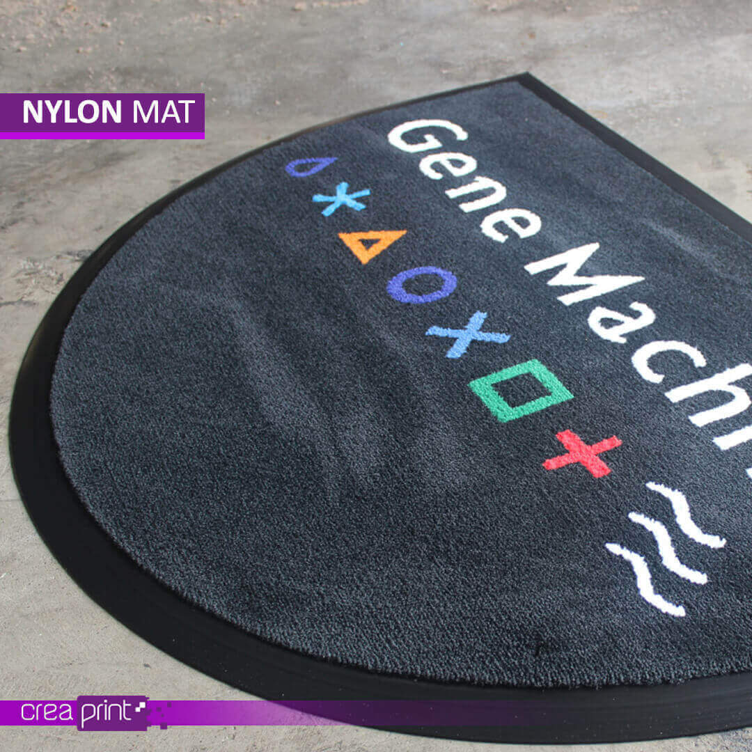Durable nylon door mat with custom logo and vibrant design, ideal for high-traffic areas.