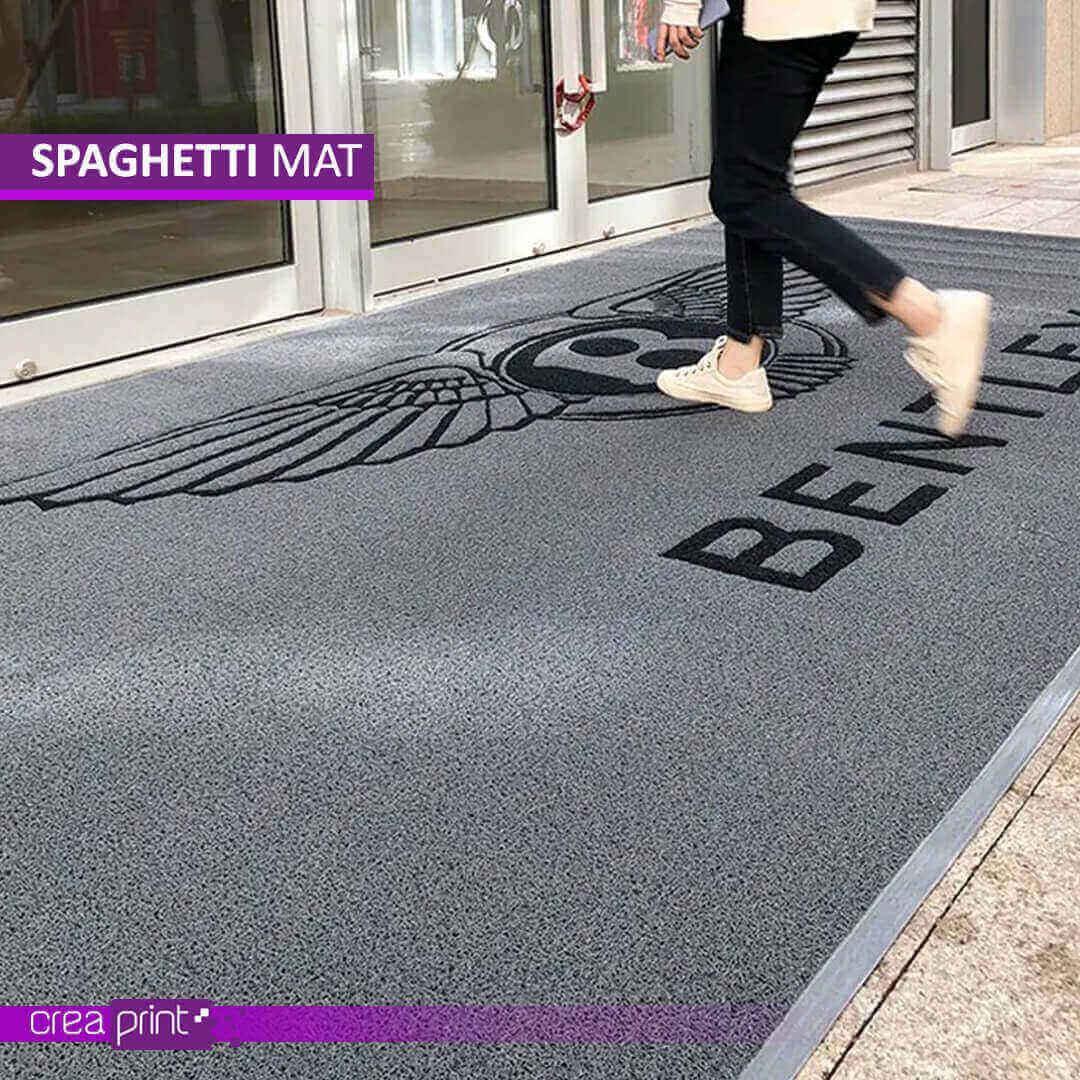 Custom spaghetti door mat with logo, designed for durability, branding, and versatile use.