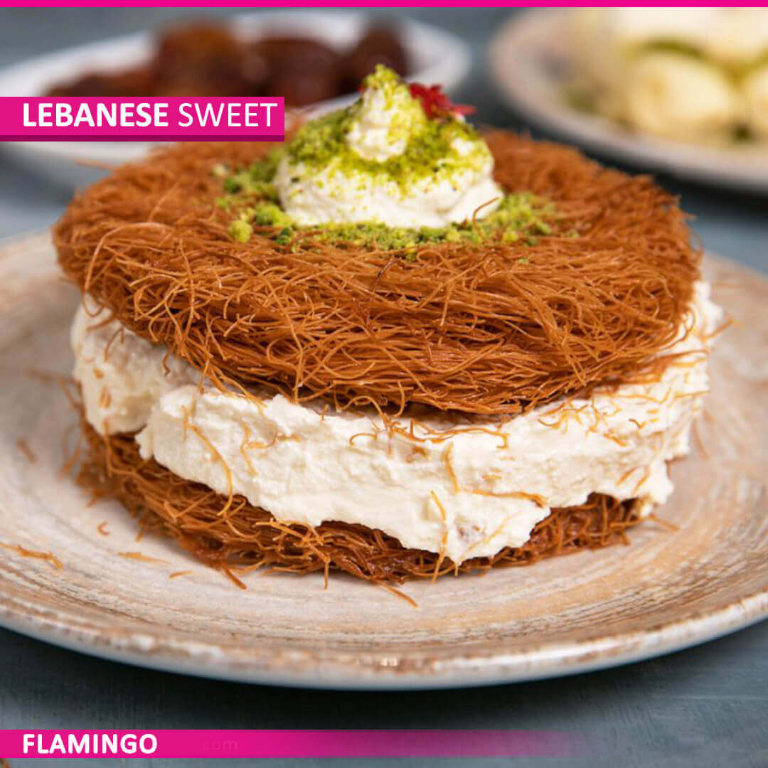 A traditional Lebanese Bassma dessert featuring layers of ashta cream sandwiched between kunafeh dough on the top and bottom.