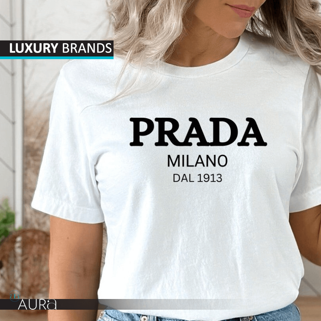 Pre-owned Prada t-shirt available at Aura Luxury – A blend of luxury and casual style.