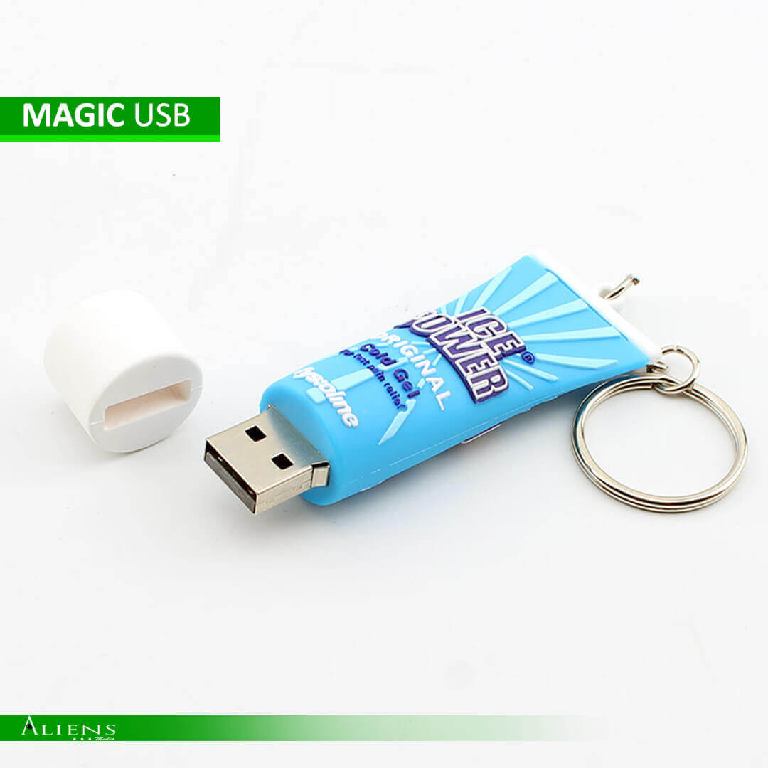 A collection of custom 3D PVC USB flash memory devices in various shapes, including a bottle, car, bike, fish, and ball.