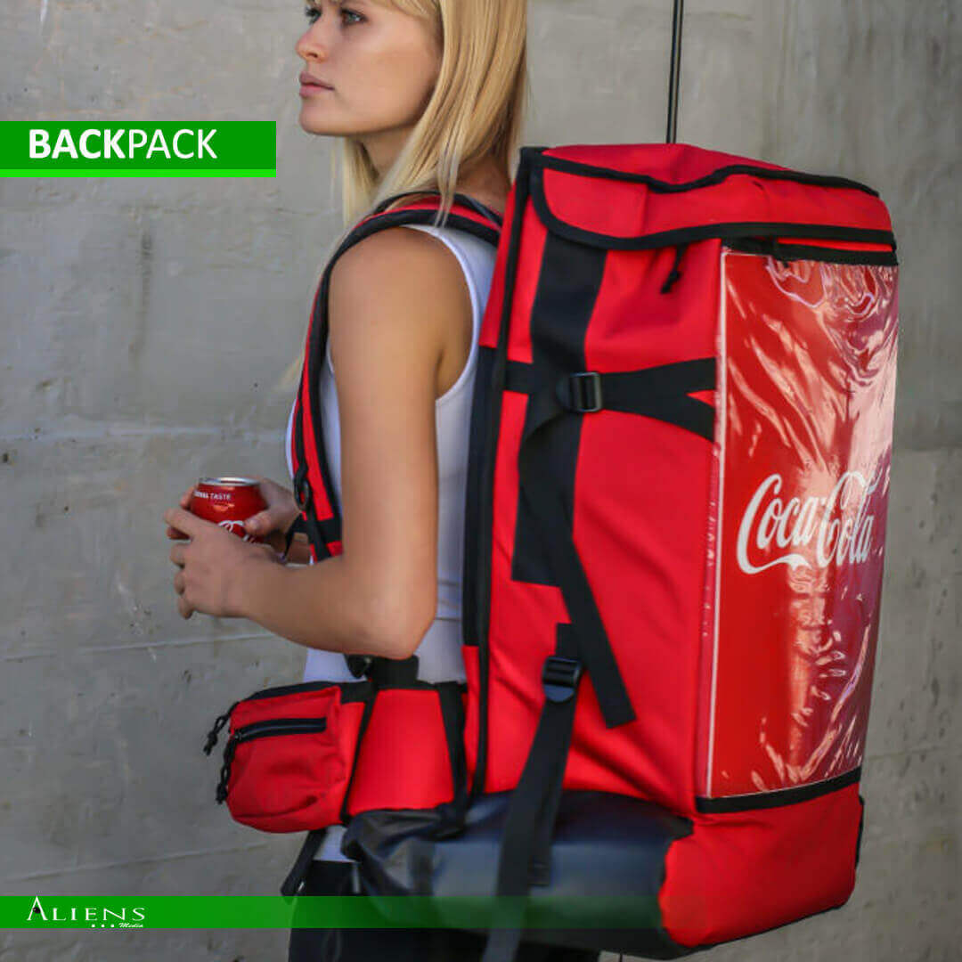 Branded backpack dispenser serving beverages at a promotional event.