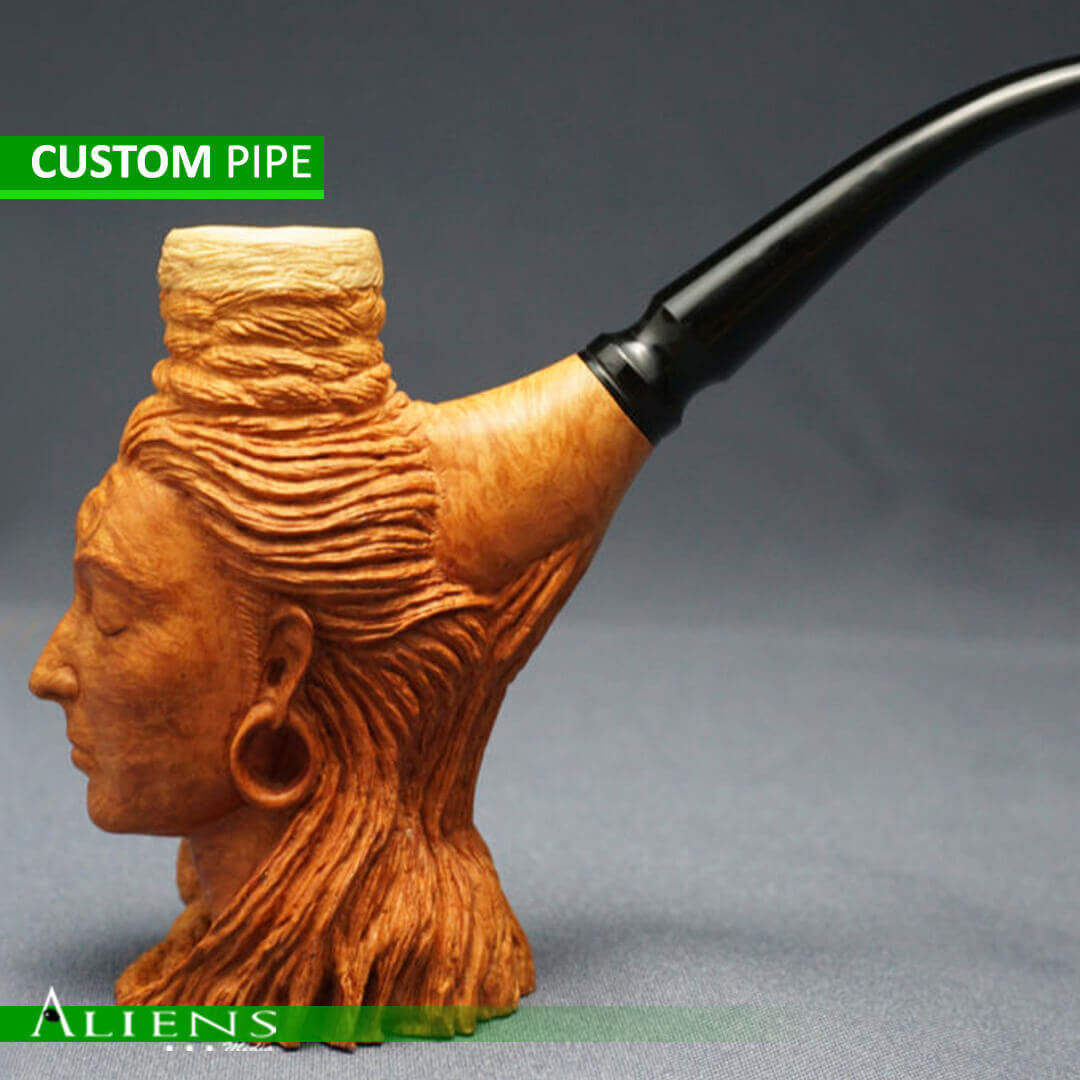 Artisan-crafted custom smoking pipe with intricate design.