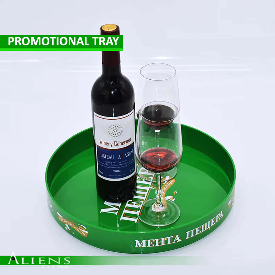 Branded promotional tray used for beverage sampling at an outdoor event.