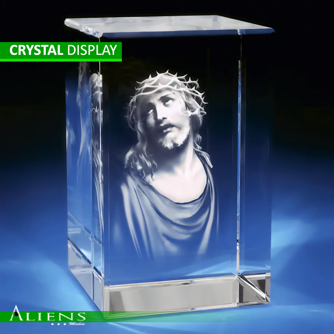 Crystal block featuring intricate 3D laser-engraved imagery for awards and branding.