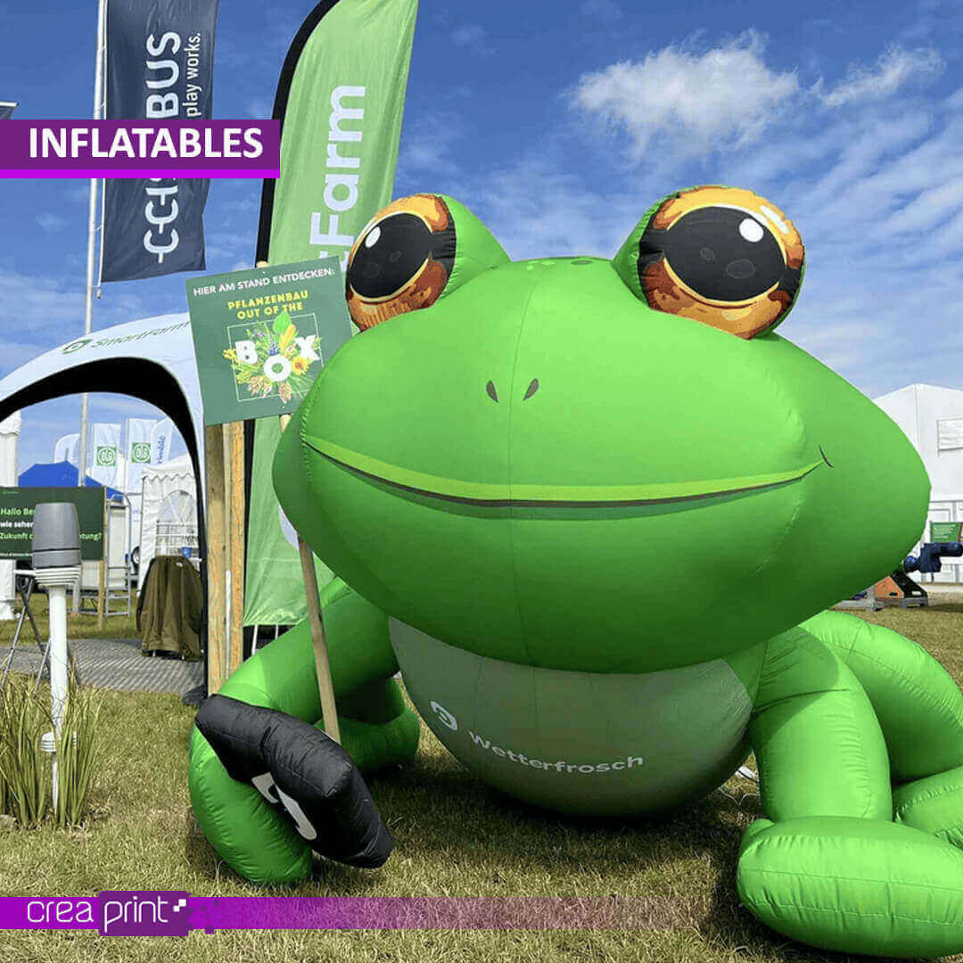 A vibrant image of a custom-designed inflatable archway at a trade show, showcasing its impressive size and eye-catching design. Attendees are drawn to the vibrant colors and engaging visuals.