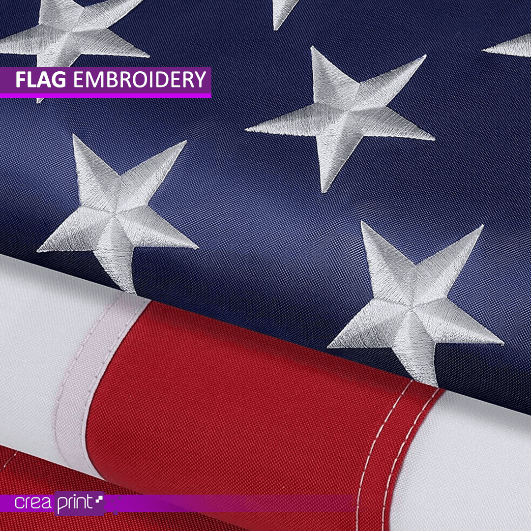Luxury embroidered flag with gold accents and a detailed crest, draped elegantly on a wooden stand.