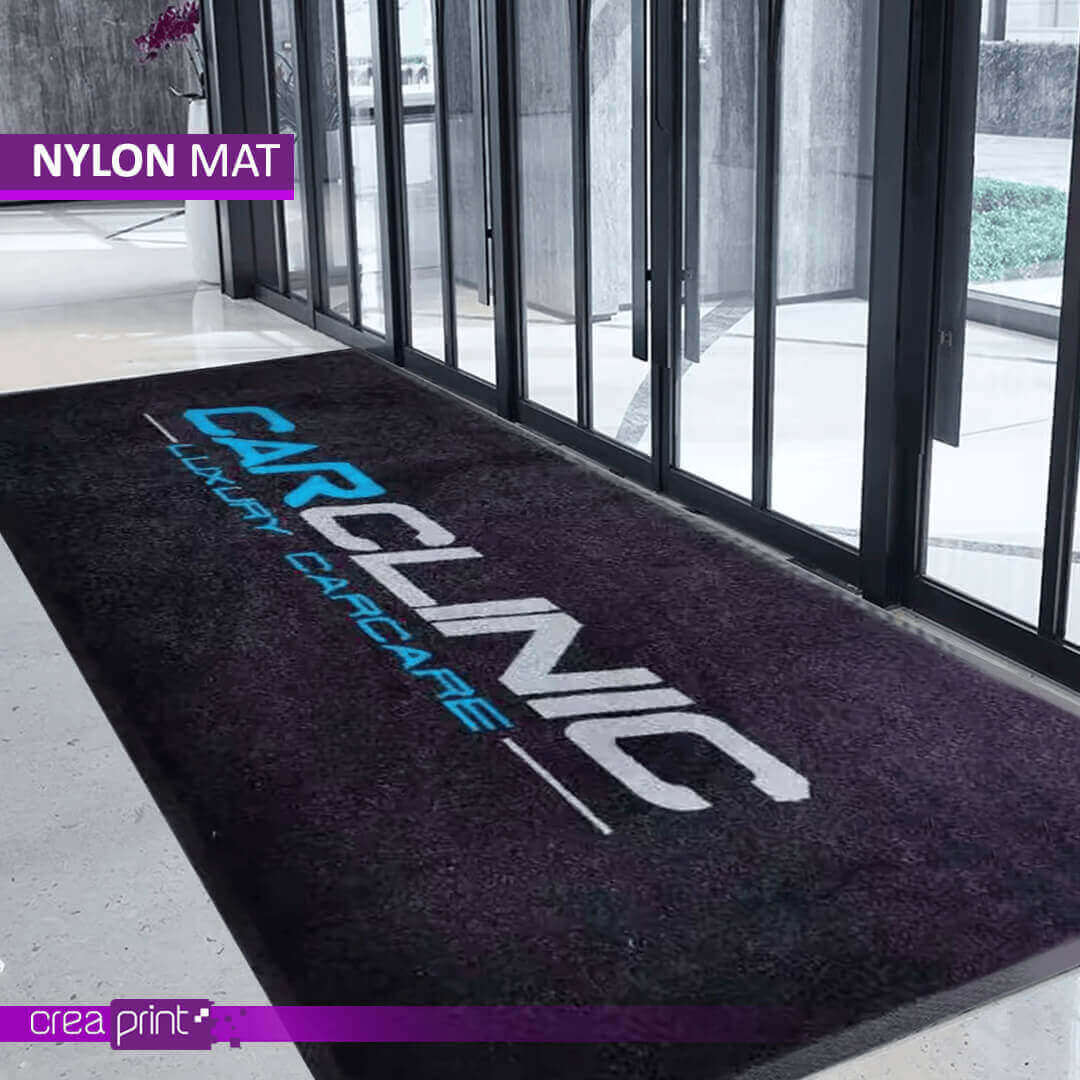 High-quality nylon door mat with custom logo and design for professional and residential use.