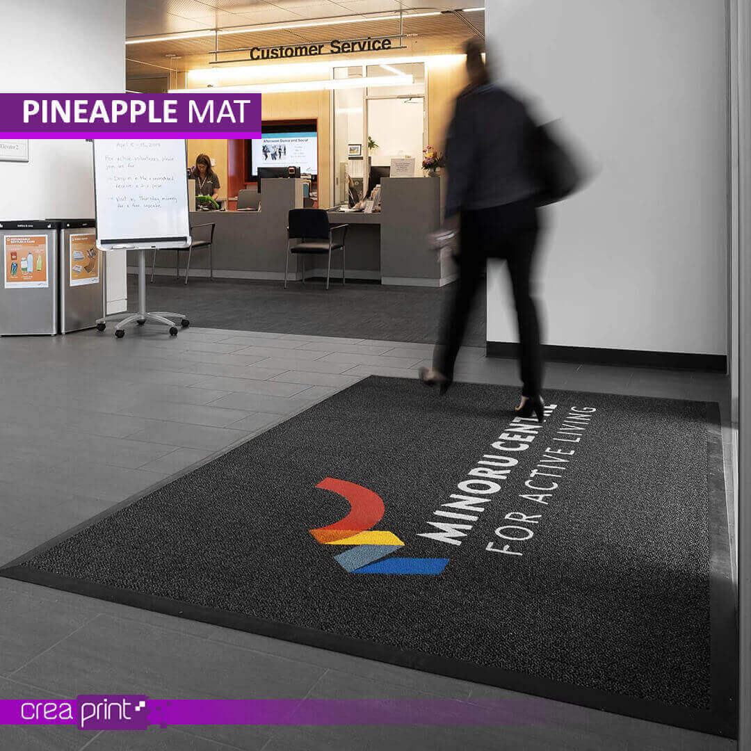 Premium Berber door mat with a custom pineapple logo, crafted for style, durability, and weather resistance, ideal for homes and businesses.
