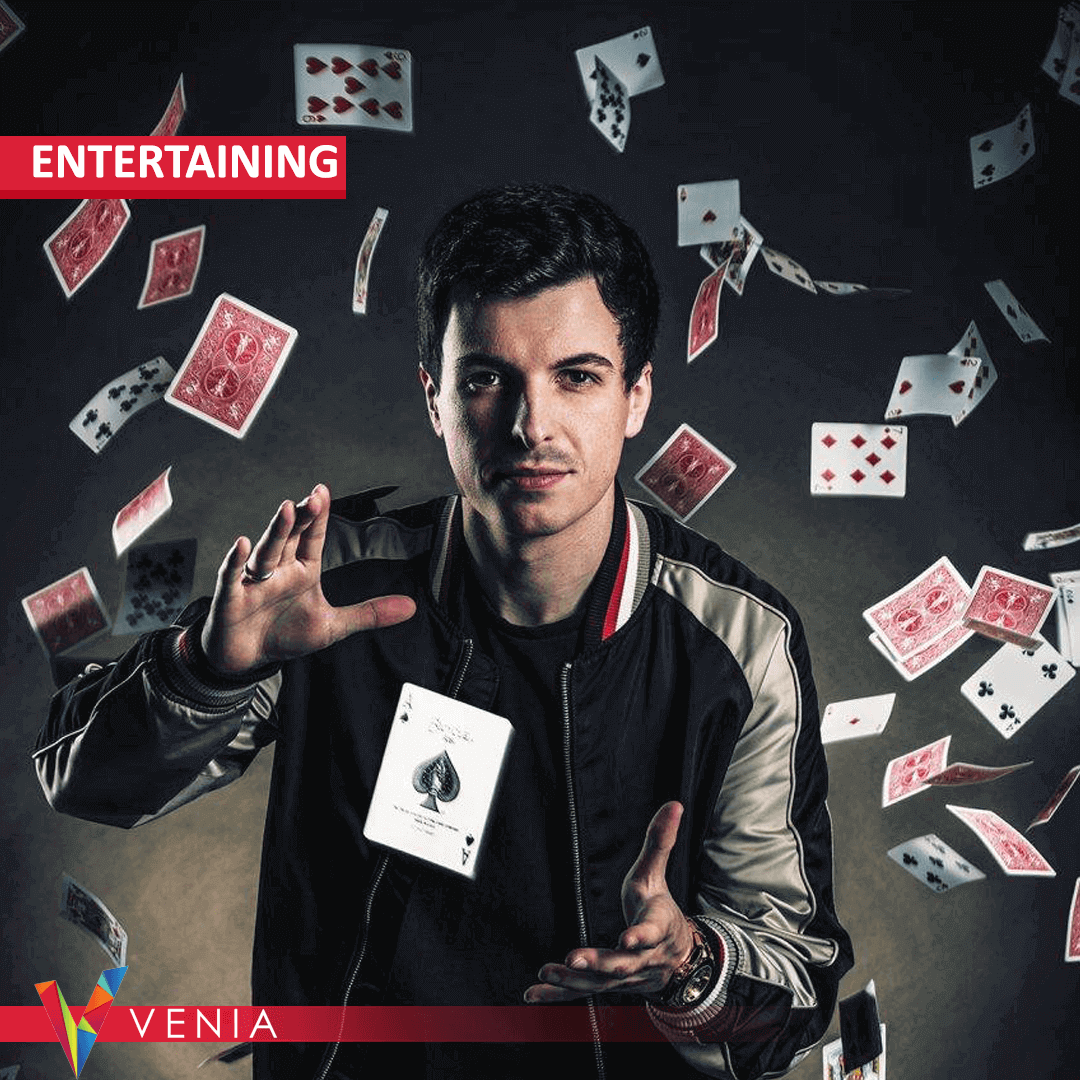 A mesmerizing image capturing the magic of a live performance, with a skilled magician performing an illusion for a captivated audience.
