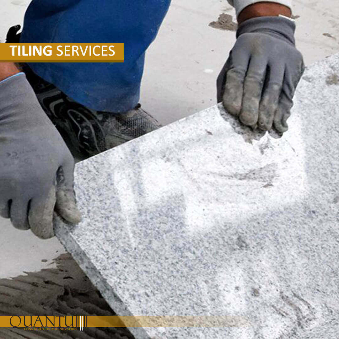 Tiling worker services by Quantum, professional tile installation and solutions.